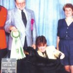 Demi is pictured here winning Best of Opposite Sex at the 1996 Canadian Summer Nationals in Regina under judge Clyde Shaw, handled by Leanne MacIver and owned by Gloria Armstrong.